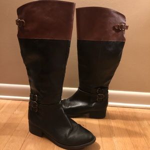 Black knee high boots with brown uppers